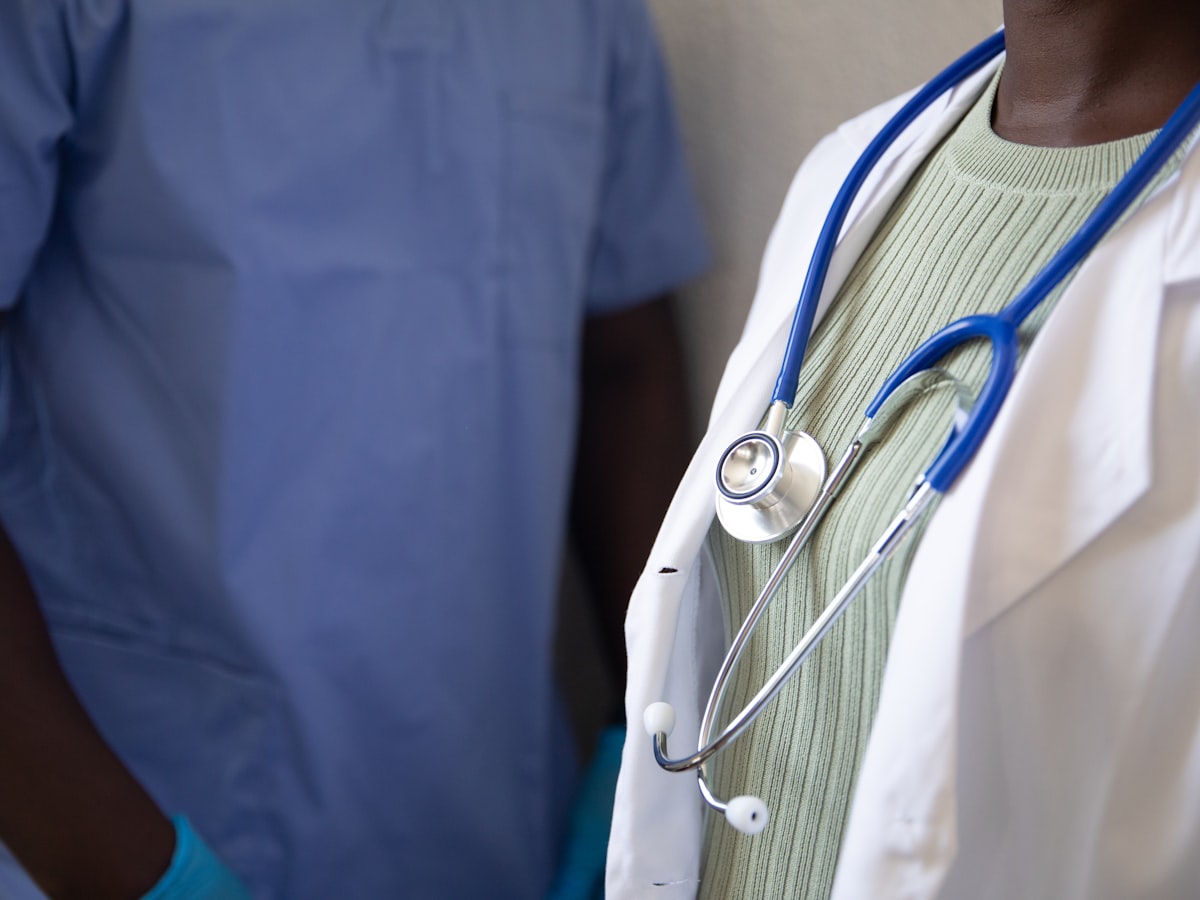 A doctor's white coat and stethoscope, up close