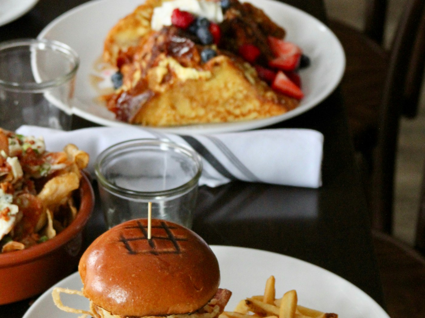 Brunch plates and a burger