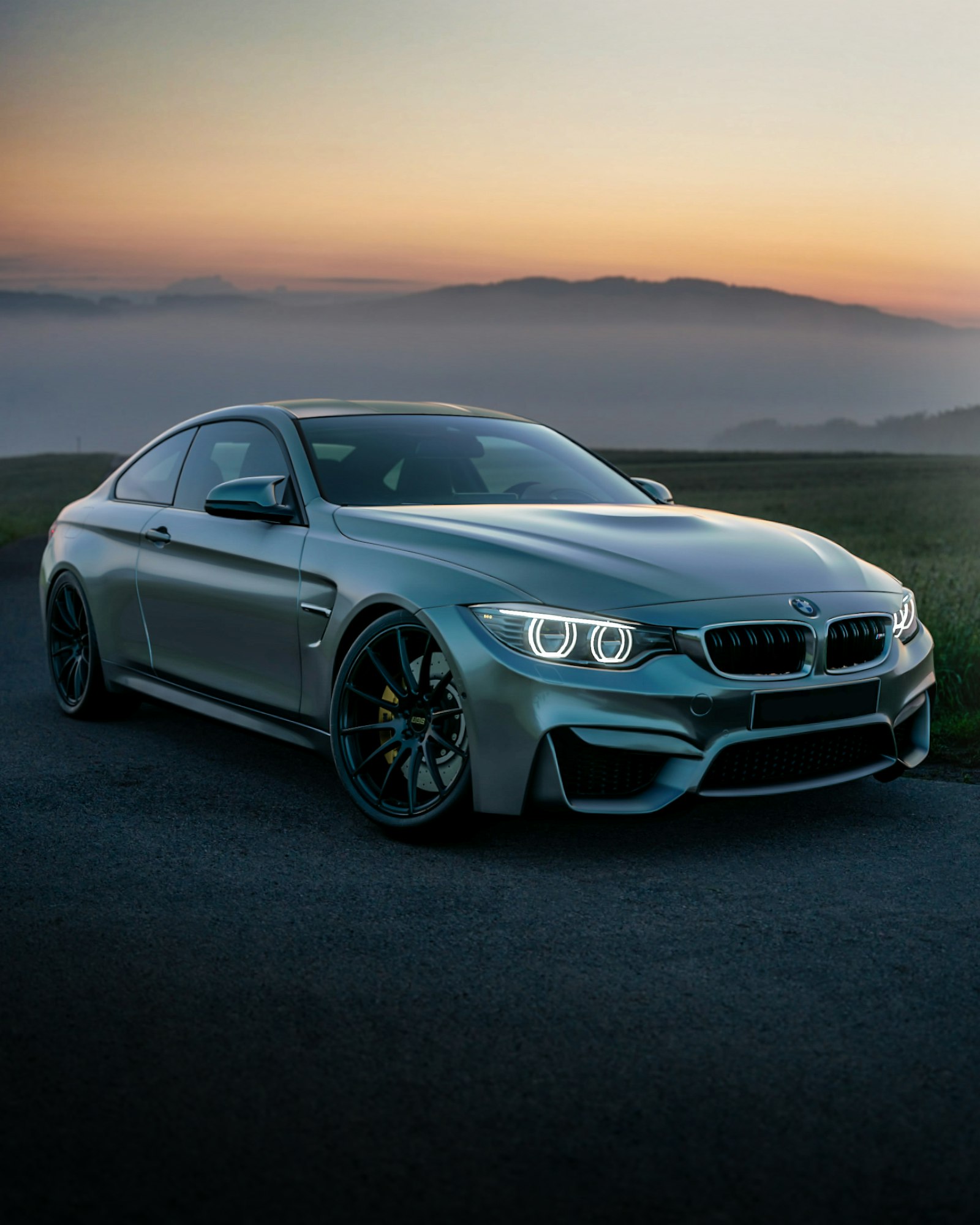 A finished car heading out at dusk
